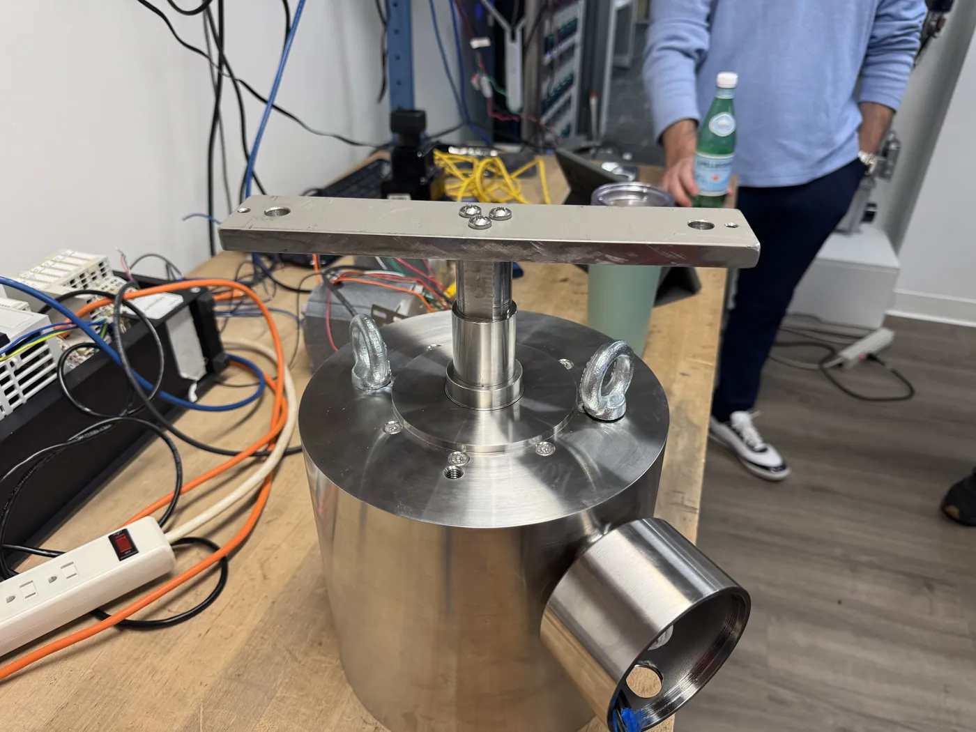 A stainless One Motion drive on a test bench, wired to a Lenze i650 inverter for sensorless control